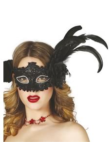 Maschera nera brillante con fiore e piume